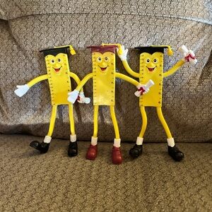 Set of Three Yellow Graduate Ruler Figurines
